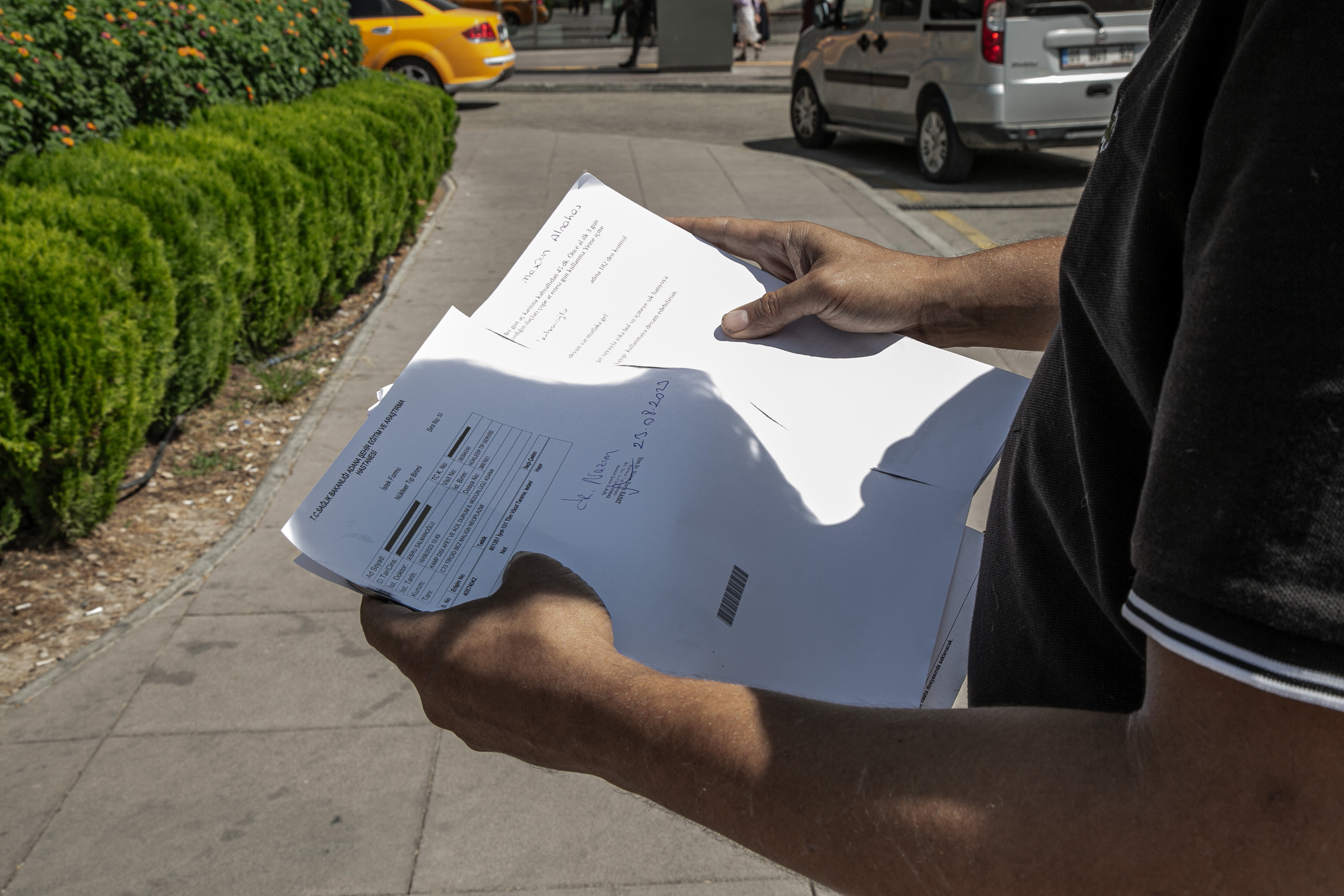 Maher is checking his medical report at a hospital in Adana. Many people in Hatay have to go to other provinces to receive health care after the earthquake destroyed many hospitals.Nadine Al Lahham