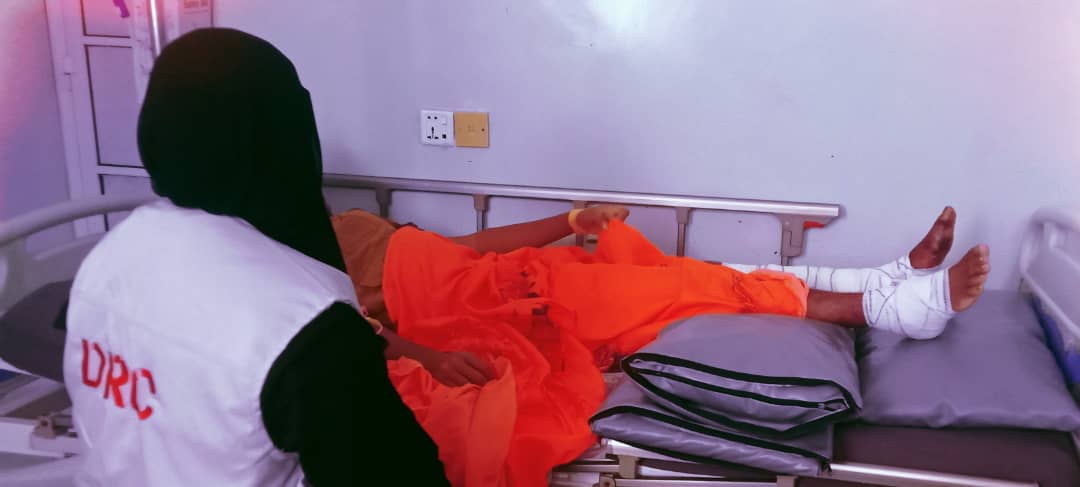 DRC staff with Ammar in the hospital in Hodeidah. 