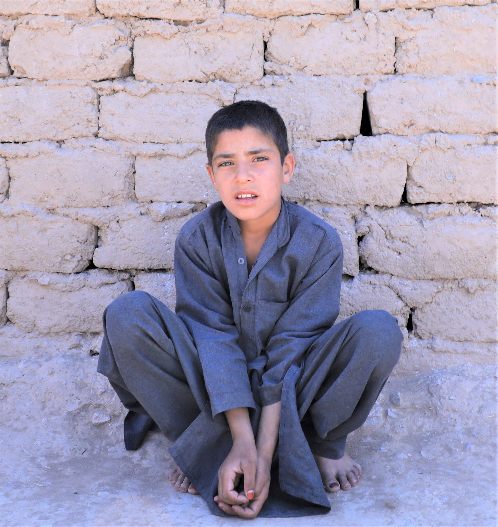 Aimal, 11, is of millions of people displaced by drought. He lives in Shahrak Sabz in Afghanistan and is solely responsible for providing for his six younger siblings, his mother and himself. Every day Aimal goes to the city to beg and sell garbage for recycling.